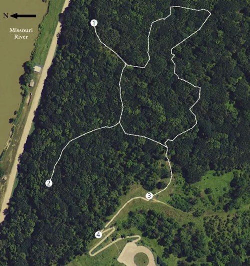 Map showing trails in a wooded area near the Missouri River, with numbered points indicating specific locations.