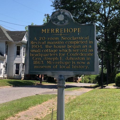 Sign for Merrehop, a 20-room Neoclassical mansion from 1904, once a Confederate headquarters, now a local history museum.