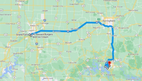 Map showing a route from Grand Falls to Springfield, passing through Branson West and highlighting All Aboard Burgers.