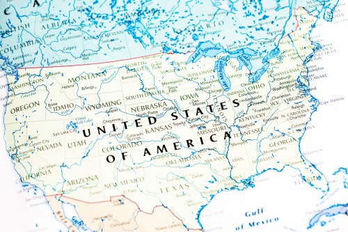 Map of the United States, highlighting states and geographical features in a colorful, detailed design.