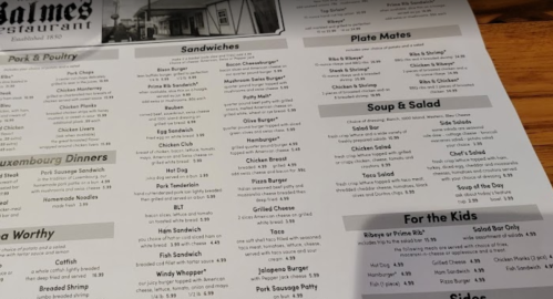 Menu from Palmes Restaurant featuring sections for sandwiches, soups, salads, and kids' meals with prices.