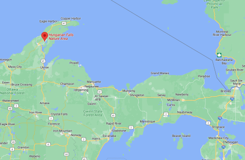 Map showing the location of Hungarian Falls Nature Area in Michigan, near Lake Superior and surrounding towns.