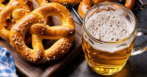 Freshly baked homemade pretzels and draft beer