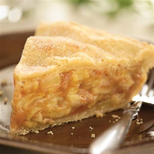 A slice of apple pie on a brown plate, showcasing layers of apples and a golden crust.