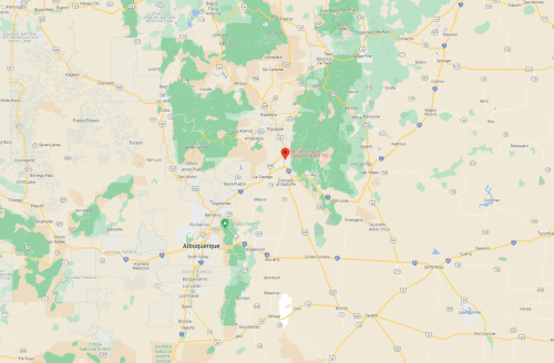 Map showing a region in New Mexico with green areas, roads, and the city of Albuquerque labeled.