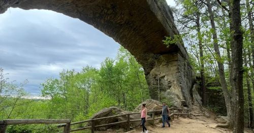 Sandstone rock formation in Kentucky resembling a natural arch.