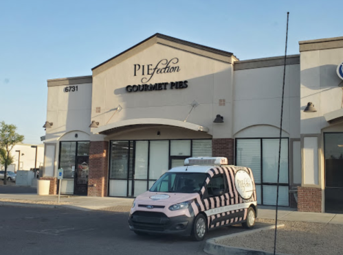 A storefront for "PIEfection Gourmet Pies" with a pink and black striped delivery van parked outside.