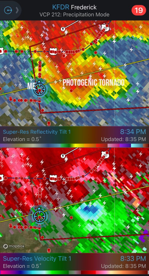 Radar image showing a photogenic tornado with super-res reflectivity and velocity data, indicating severe weather conditions.