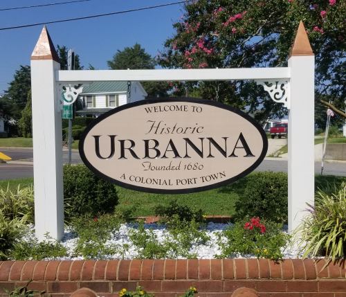 Welcome sign for Historic Urbanna, founded in 1680, highlighting its status as a colonial port town.