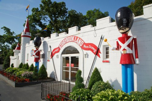 Entrance to Storybook Land in New Jersey, featuring a castle facade and large toy soldier statues.
