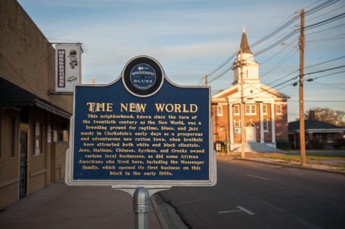 Historical marker about The New World neighborhood, highlighting its cultural significance in music and community diversity.