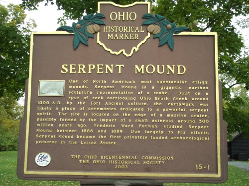 Historical marker for Serpent Mound in Ohio, detailing its significance and archaeological history.