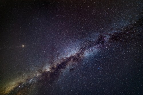 A stunning view of the Milky Way galaxy filled with stars and cosmic dust against a dark sky.