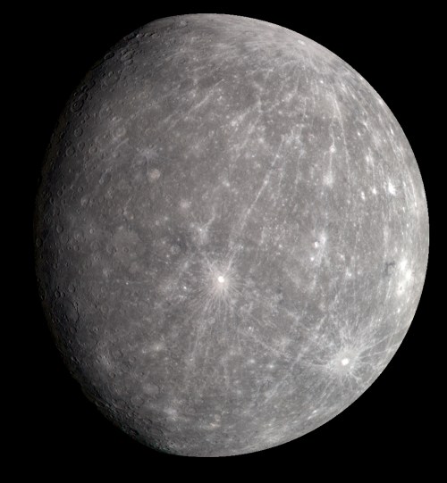 A detailed view of Mercury, showcasing its cratered surface and grayish texture against a black background.