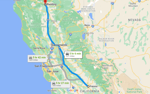 Map showing driving routes from Fresno to Redding, California, with estimated travel times and distances.