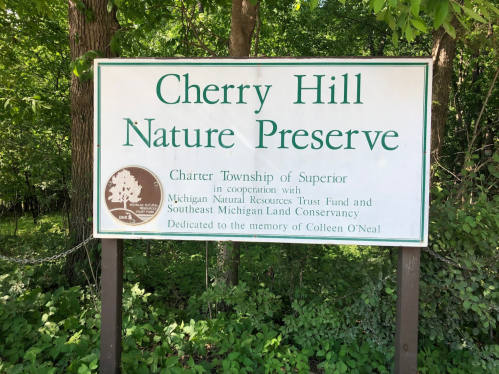 Sign for Cherry Hill Nature Preserve, dedicated to Colleen O'Neal, located in Superior Township, Michigan.