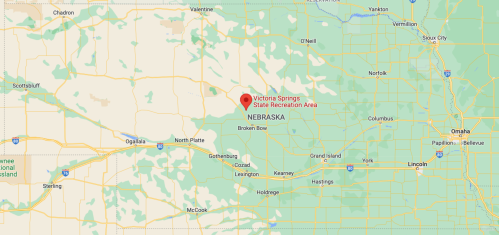 Map highlighting Victoria Springs State Recreation Area in Nebraska, surrounded by green areas and highways.