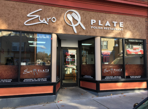 Exterior of Euro Plate, a Polish restaurant, featuring large windows and a welcoming entrance.