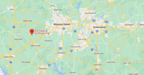 Map showing the area between Winston-Salem and Greensboro, North Carolina, with a marker for "The Fields at Sunflower Trail."