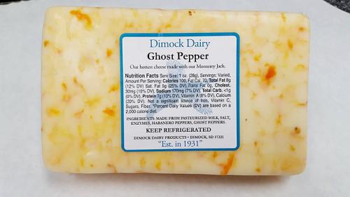 Block of Dimock Dairy Ghost Pepper cheese with a blue label detailing nutrition facts and ingredients.