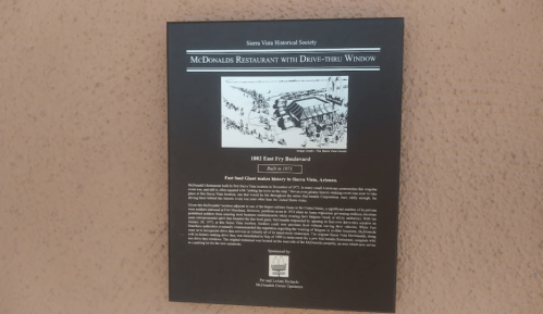 Plaque detailing the history of the McDonald's restaurant with a drive-thru window in Sierra Vista, Arizona.