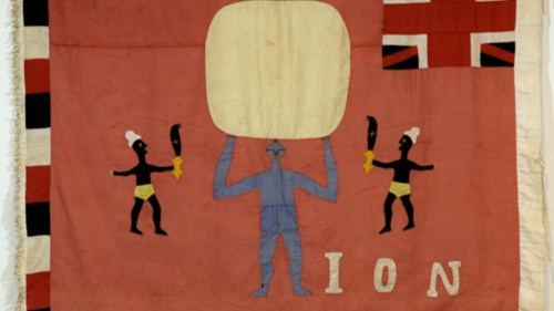 A historical banner featuring a central figure holding a large object, flanked by two figures with feathers and stars.