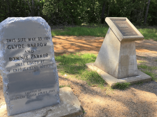 Memorial stones marking the site where Clyde Barrow and Bonnie Parker were killed by law enforcement on May 23, 1934.