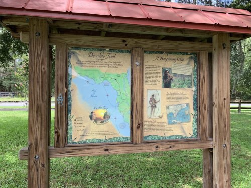 Information sign featuring a map and historical details about De Soto Trail and a Burgoyne Camp.
