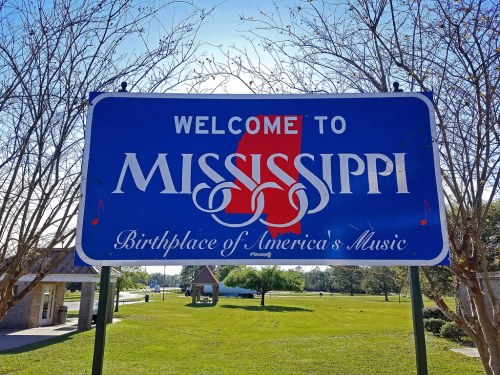 Welcome sign for Mississippi, featuring musical notes and the phrase "Birthplace of America's Music."
