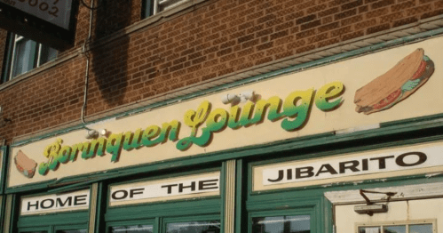 Sign for Borinquen Lounge, featuring the text "Home of the Jibarito" with a sandwich illustration.