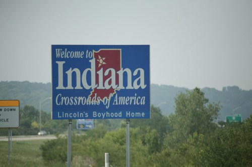 Welcome sign for Indiana, featuring "Crossroads of America" and a mention of Lincoln's Boyhood Home.