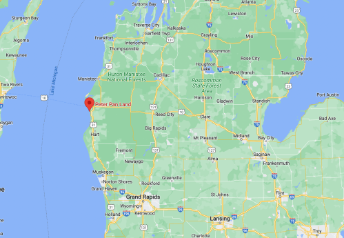 Map showing the location of Peter Pan Land in Michigan, near Lake Michigan and surrounding forests.