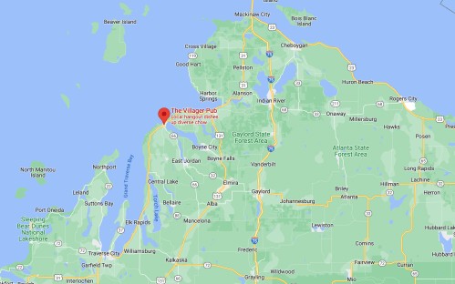 Map showing northern Michigan with a marker for The Villager Pub near the tip of the Leelanau Peninsula.