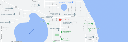 Map showing a coastal area with streets, parks, and a location labeled "Coffee Shop of Horrors."