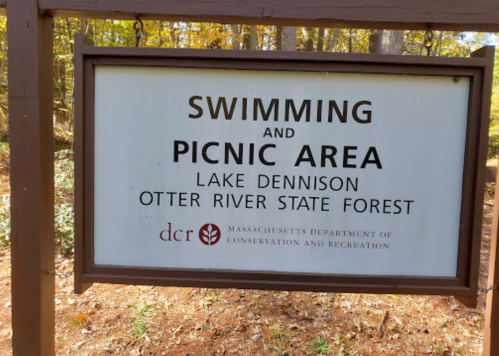 Sign for the swimming and picnic area at Lake Dennison, Otter River State Forest, Massachusetts.