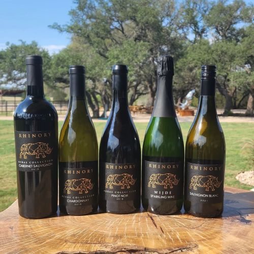 Five bottles of wine from Rhinary, including Cabernet Sauvignon, Chardonnay, Pinot Noir, Sparkling Wine, and Sauvignon Blanc.