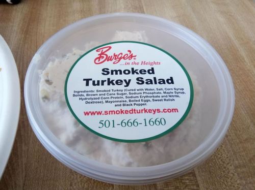 Container of smoked turkey salad with ingredients listed, including smoked turkey, mayonnaise, and various seasonings.