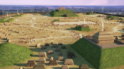 Aerial view of a historical settlement with mounds, huts, and people gathered in an open area, surrounded by greenery.