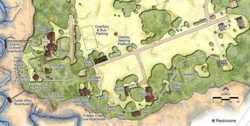 Map of a park featuring various buildings, paths, and restrooms, with labeled areas like Discovery House and Heritage Garden.