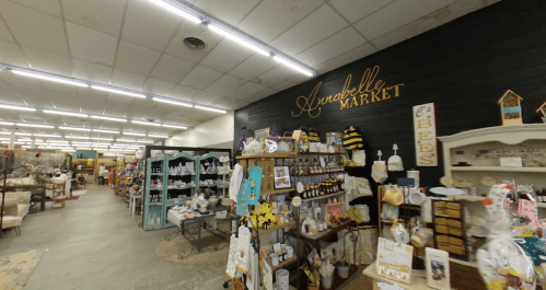 Interior of Annabelle Market featuring shelves of various products and a cozy, well-lit shopping atmosphere.
