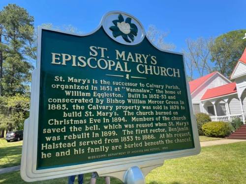 Historical marker for St. Mary's Episcopal Church, detailing its founding, reconstruction, and significant events.