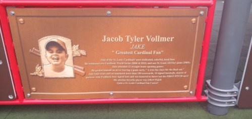 Plaque honoring Jacob Tyler Vollmer, a dedicated St. Louis Cardinals fan, with a photo and tribute to his legacy.