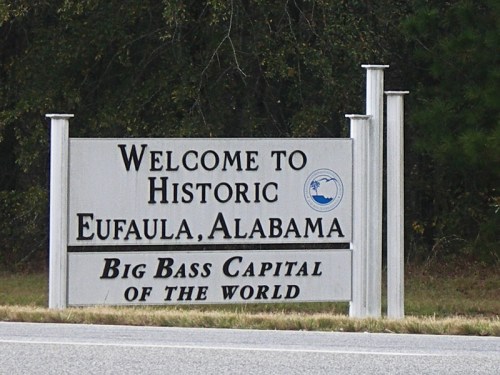 Sign welcoming visitors to Eufaula, Alabama, highlighting it as the "Big Bass Capital of the World."