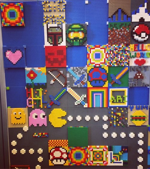 Colorful mosaic made of LEGO bricks featuring various pop culture icons and designs, including characters and symbols.