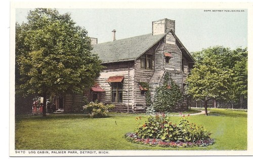 A vintage postcard of a log cabin in Palmer Park, Detroit, surrounded by greenery and colorful flower beds.
