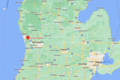 Map showing Michigan with a red marker indicating Nunica Cemetery near Grand Rapids, along with nearby cities.