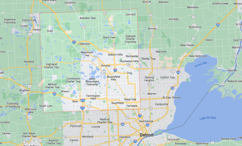 Map of the Detroit area, showing various towns and cities, including Pontiac, Troy, and Bloomfield Township.