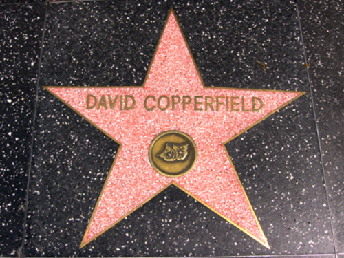 Star on the Hollywood Walk of Fame honoring David Copperfield, featuring a pink star with gold lettering.