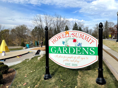 Sign for Howell Summit Gardens, a community space for all ages to gather and play, established in 2020.