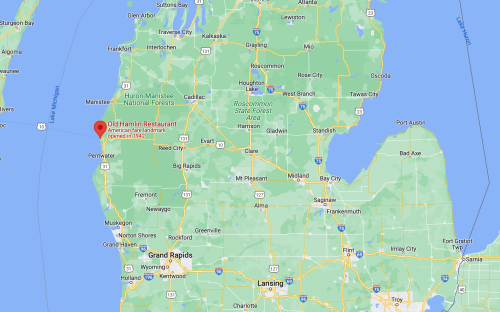 Map showing Michigan with a marker for Old Hamlin Restaurant near Pentwater, highlighting nearby towns and landmarks.